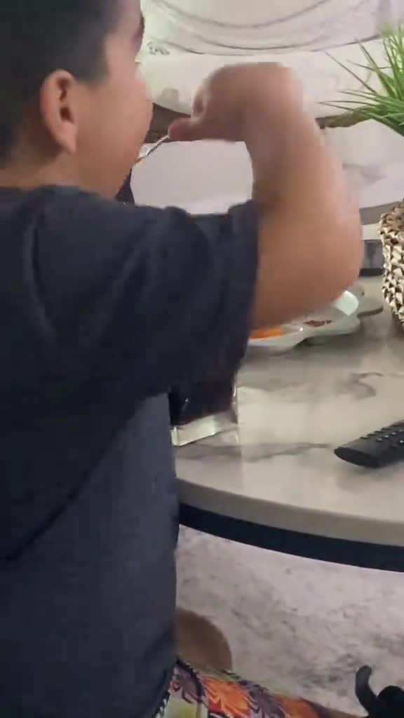 Drinking-cola-with-a-spoon.mp4